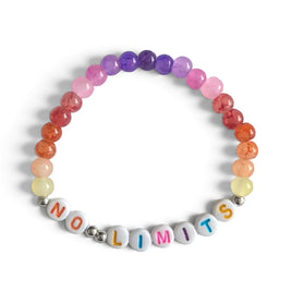 Colorful beaded bracelet with 'NO LIMITS' letter beads, rainbow gradient stones, and silver spacers on white fabric.
